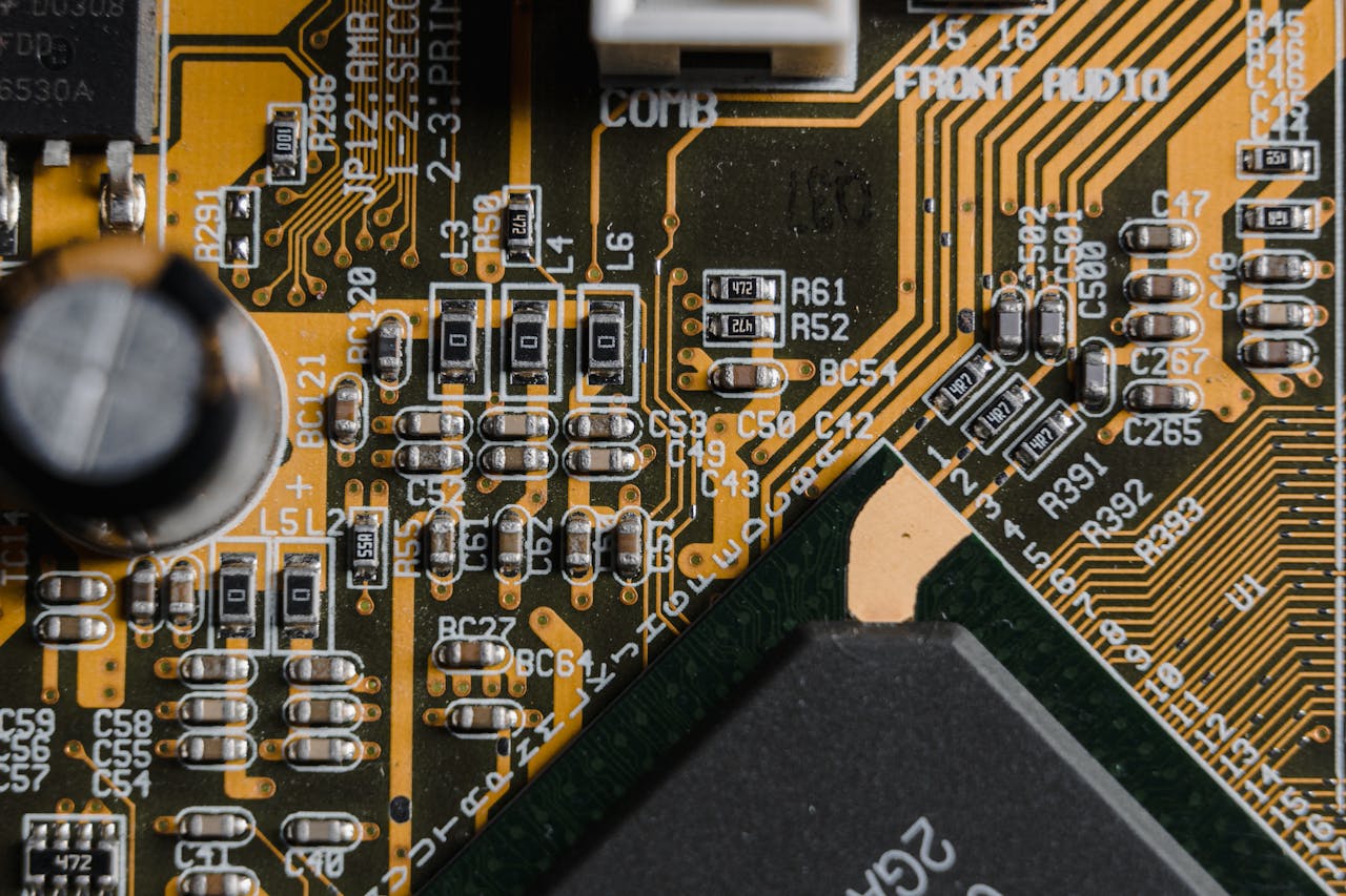 Mastering the First Impression: Your intriguing post title goes here High-resolution close-up of a circuit board showing intricate electronic components and pathways.